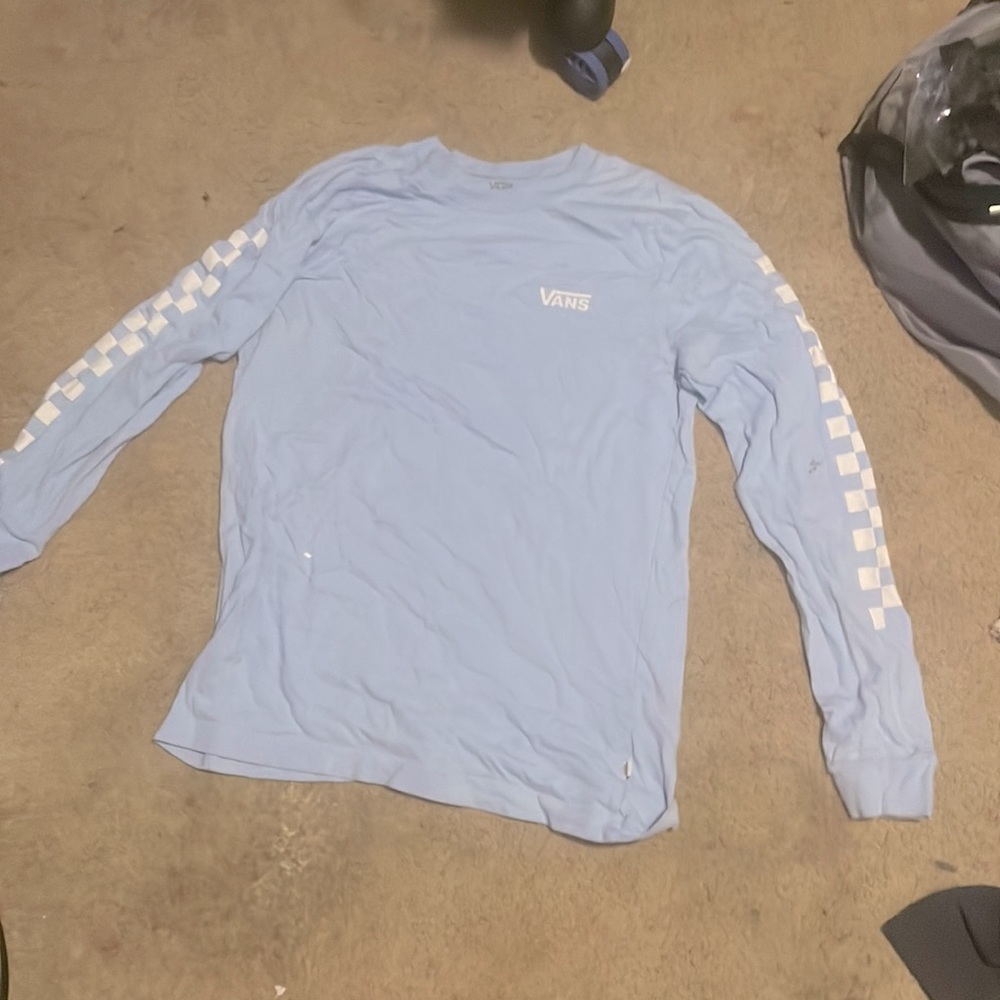 A light blue Van shirt